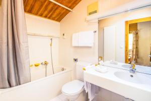 Koupelna v ubytování Hôtel Magrappé