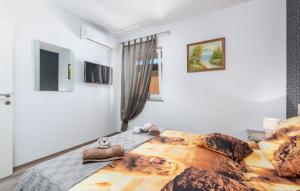 Posteľ alebo postele v izbe v ubytovaní Holiday House Pudarica