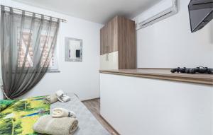 Televízia a/alebo spoločenská miestnosť v ubytovaní Holiday House Pudarica