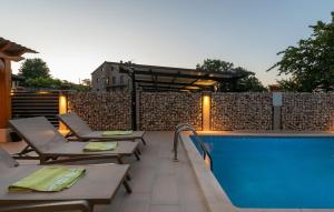 Bazén v ubytovaní Holiday House Pudarica alebo v jeho blízkosti