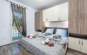 Posteľ alebo postele v izbe v ubytovaní Holiday House Pudarica