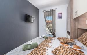 Posteľ alebo postele v izbe v ubytovaní Holiday House Pudarica
