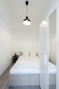 Posteľ alebo postele v izbe v ubytovaní King Seventeen Homes