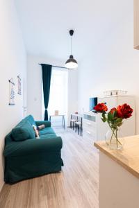 Televízia a/alebo spoločenská miestnosť v ubytovaní King Seventeen Homes + 37 fotografií