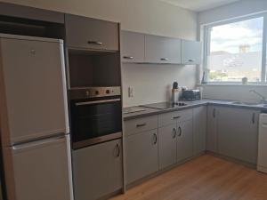 Küche/Küchenzeile in der Unterkunft 360 Town Stay Apartments & Studios