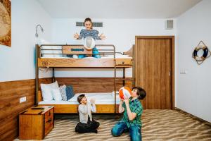 Postel nebo postele na pokoji v ubytování Aquapalace Hotel Prague