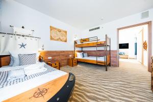 Postel nebo postele na pokoji v ubytování Aquapalace Hotel Prague