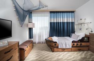 Postel nebo postele na pokoji v ubytování Aquapalace Hotel Prague