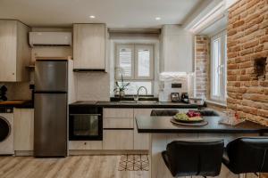 Køkken eller tekøkken på Palazzino Veneziano Luxury Apartment