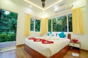 Misty Range Resorts客房内的一张或多张床位