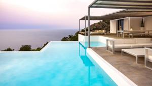 Villa con piscina y vistas al océano en Villa Na Xamena Ibiza, en Sant Miquel de Balansat