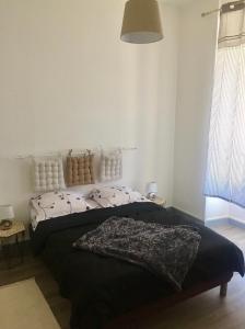 Posteľ alebo postele v izbe v ubytovaní Charmant T2 proche vieille ville