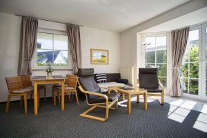 Et opholdsområde på nah am Meer, ruhige Lage, gratis Nutzung vom AHOI Erlebnisbad und Sauna in Sellin - Haus Inselblick FeWo 02