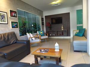 Posezení v ubytování Hotel Pousada Calliandra