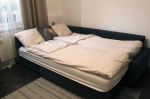 En eller flere senge i et værelse på Elegant apartment in the center of Sofia
