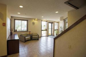 a hallway of a hospital with a waiting room at Americas Best Value Inn Greenbush Albany in East Greenbush