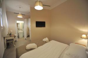 Ein Bett oder Betten in einem Zimmer der Unterkunft Villa Zaccardi