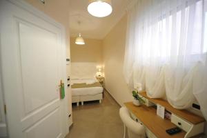 Ein Bett oder Betten in einem Zimmer der Unterkunft Villa Zaccardi