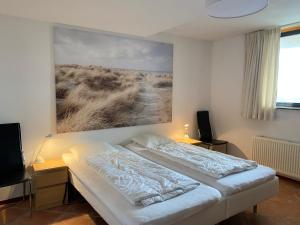 Postel nebo postele na pokoji v ubytování Callantsoger Staete A301