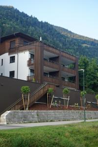 a building with a staircase in front of it at Ferienwohnung Karasek Deluxe in Sattendorf