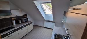 Kuchyňa alebo kuchynka v ubytovaní Apartmány Adieu 2