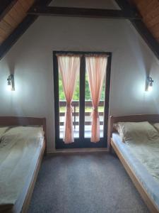 Ένα ή περισσότερα κρεβάτια σε δωμάτιο στο Vacation home Zara