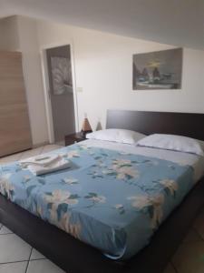 Postel nebo postele na pokoji v ubytování Etna mare