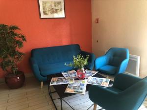 Posezení v ubytování Kyriad Direct Nancy Sud -Vandoeuvre - Rénové