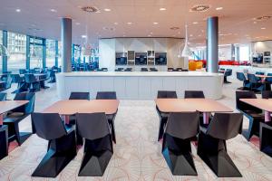 Ein Restaurant oder anderes Speiselokal in der Unterkunft Prize by Radisson, Vienna City 
