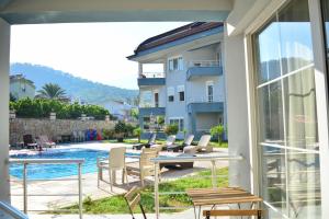 Bazén v ubytování Kemer Babel Residence nebo v jeho okolí