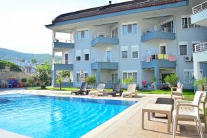 Bazén v ubytování Kemer Babel Residence nebo v jeho okolí