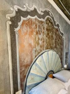 Posteľ alebo postele v izbe v ubytovaní La Corte B&B