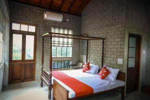 Una cama o camas en una habitación de Villa Wave Spice