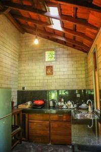 Una cocina o cocineta en Villa Wave Spice