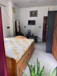 Ένα ή περισσότερα κρεβάτια σε δωμάτιο στο Happy Homestay Sittong