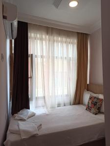 Postel nebo postele na pokoji v ubytování moonlight (AY IŞIĞI )