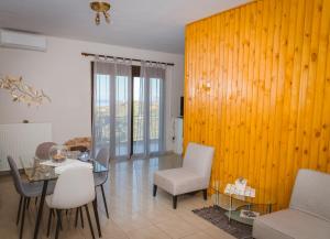 Posezení v ubytování Aristos Apartments & Suites