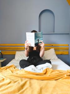 Postel nebo postele na pokoji v ubytování Lamparina Hostel