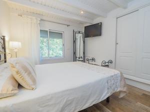Łóżko lub łóżka w pokoju w obiekcie Cubo's Finca La Fuente del Pedregal Casa 2