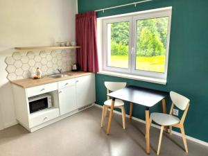Fotografia z galérie ubytovania Apartmány U Jeskyní v destinácii Sloup
