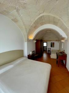 Postel nebo postele na pokoji v ubytování Masseria La Porticella