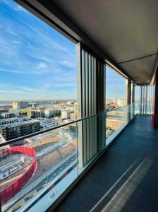 a balcony with a view of a city at The Perfect inn in London