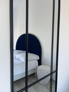 Łóżko lub łóżka w pokoju w obiekcie VILLA LA QUIETUDE