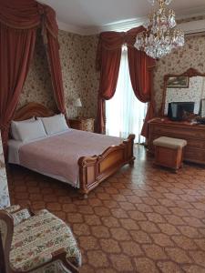 Ένα ή περισσότερα κρεβάτια σε δωμάτιο στο Castle By The Sea