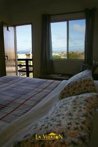 Postel nebo postele na pokoji v ubytování Hostal La Virazón