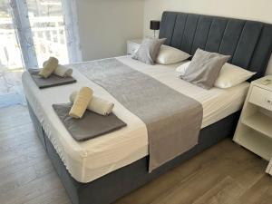 Postel nebo postele na pokoji v ubytování Apartments Villa Zdrava