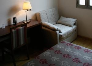Postel nebo postele na pokoji v ubytování TCH Hotel