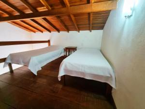 Postel nebo postele na pokoji v ubytování Pousada Rumo dos Ventos