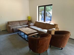 Posezení v ubytování Zonga Chalet Catan