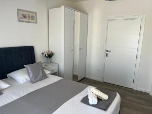Postel nebo postele na pokoji v ubytování Apartments Villa Zdrava